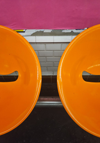 Orange Paris subway station chairs