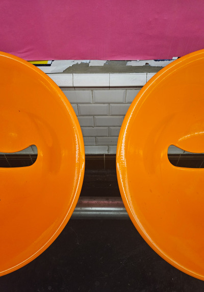 Orange Paris subway station chairs